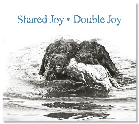 Två barbeter som visar att delad glädje är dubbel glädje